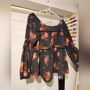 This is a wide neck peasant top